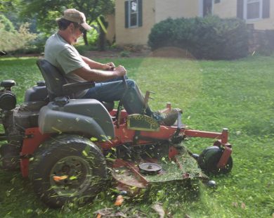 Man cutting grass