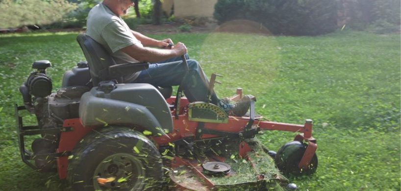 Man cutting grass